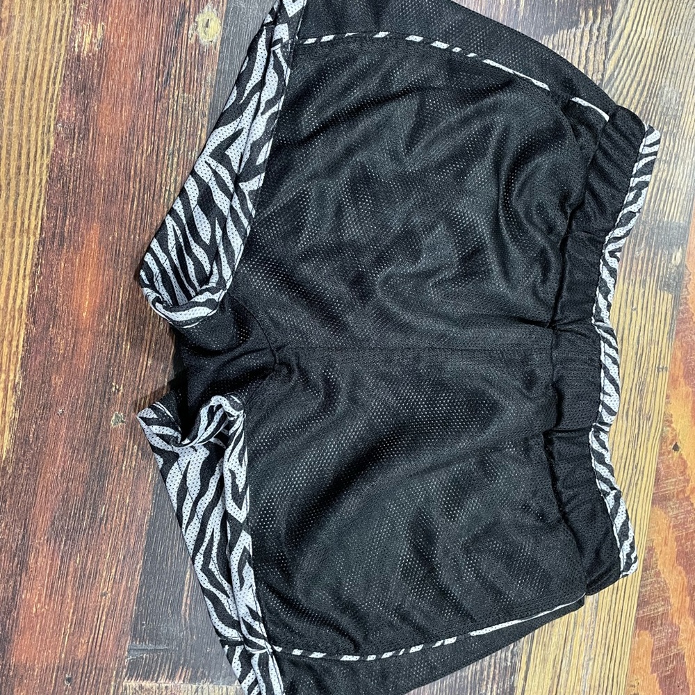Reversible zebra to black small shorts